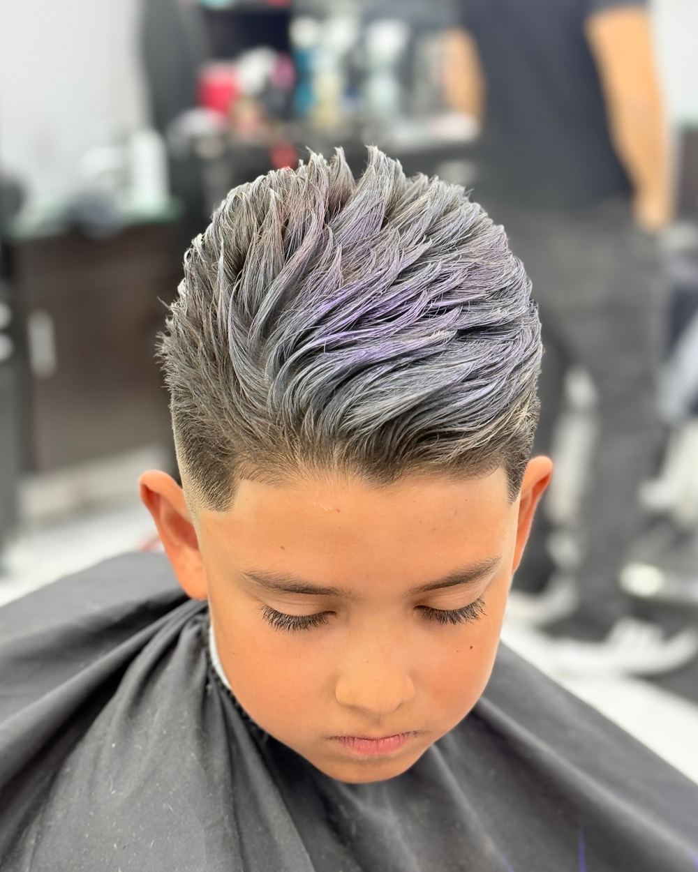Kids' cut: a textured quiff with a fade