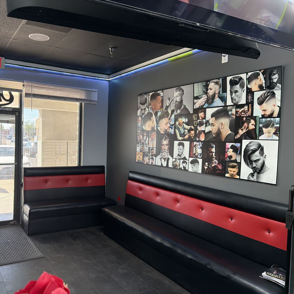 The style wall of haircut photos above the waiting bench