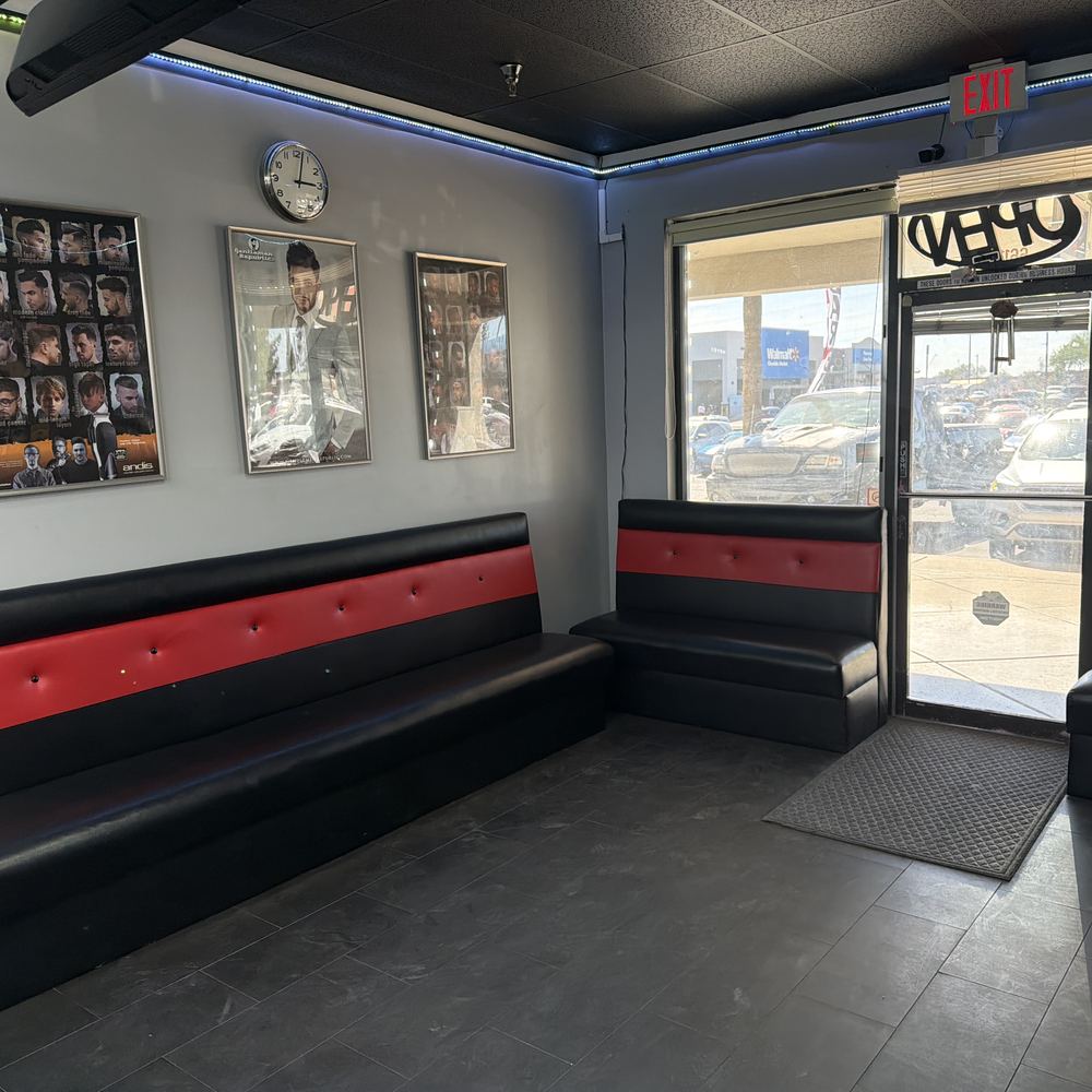 The waiting area: red and black benches by the front door